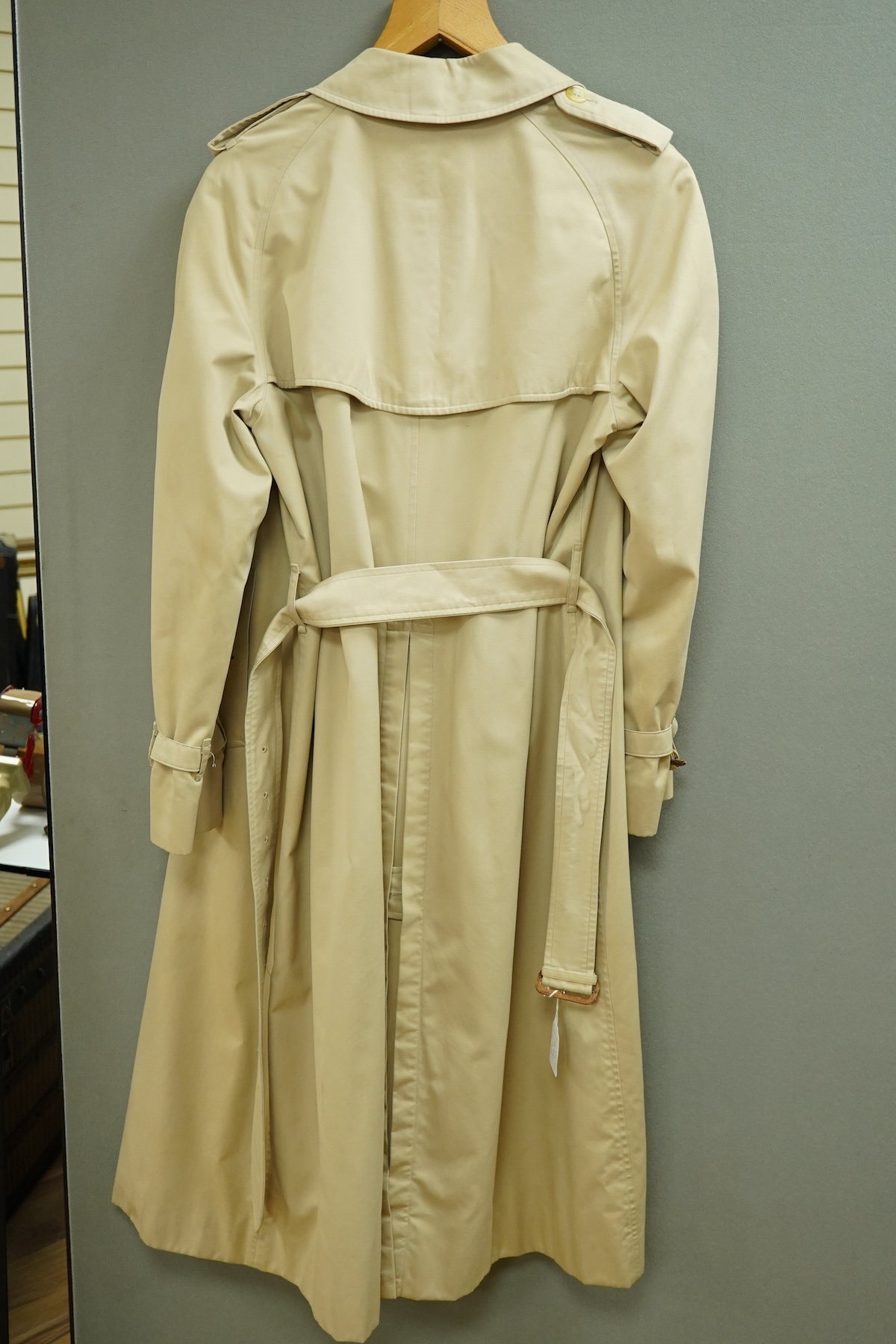 A ladies Burberry mac with check lining and belt, size 16 Long
